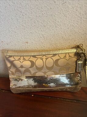 Coach Gold Signature Sequin Clutch Wristlet